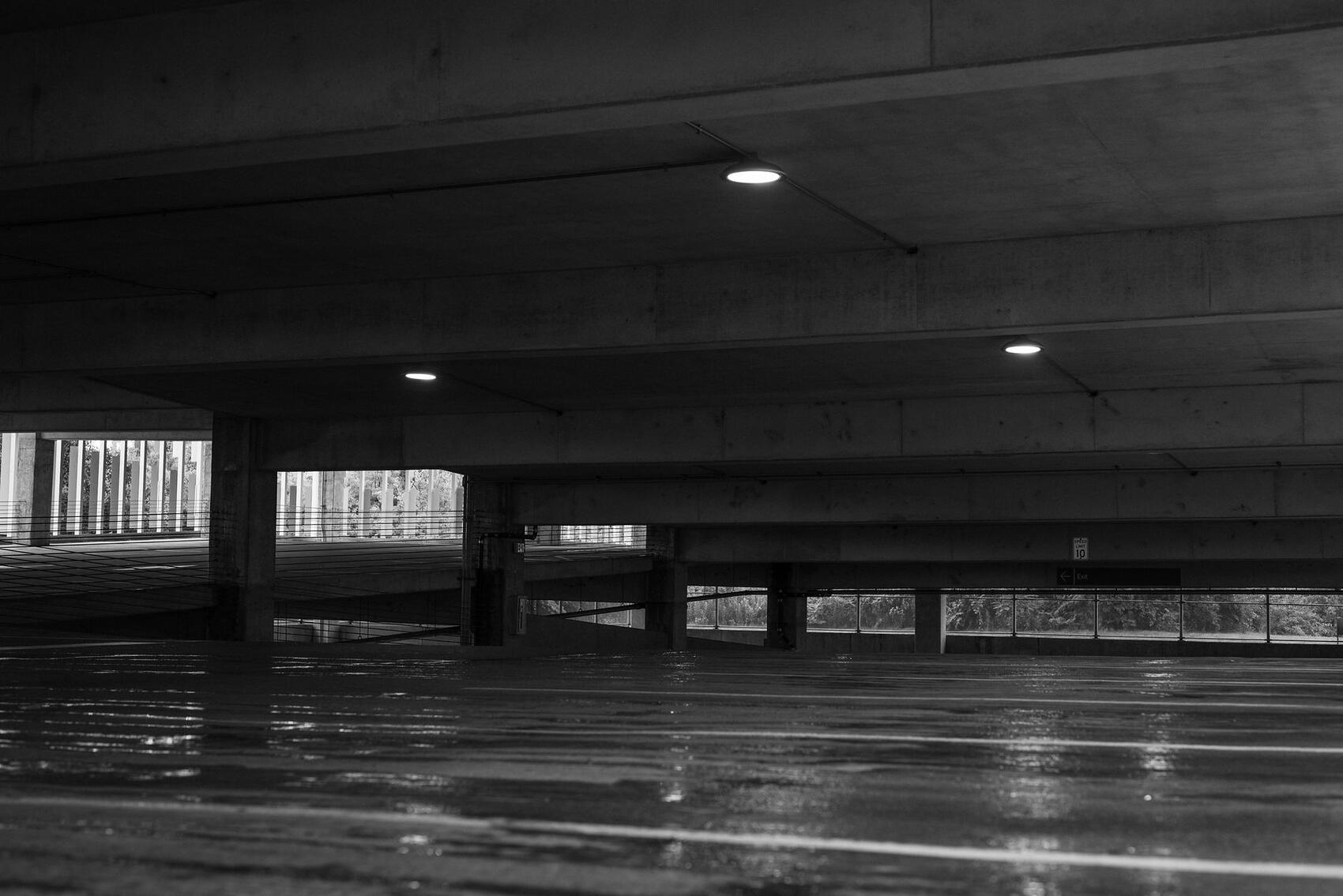 An empty parking deck at night